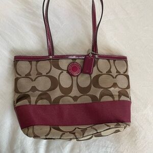 Coach tote, Signature collection.  Colors are Khaki, brown and burgundy